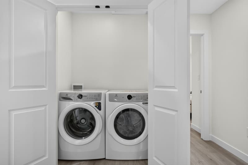 In-suite laundry with side-by-side washer and dryer
